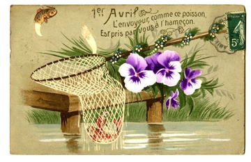 Carte postale représentant un ponton sur lequel sont posées une épuisette et des pensées. Au dessus, on lit "1er Avril, l'envoyeur, comme ce poisson, est pris par vous à l'hameçon"