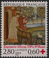 Timbre sur lequel est représentée une tapisserie montrant un homme tenant la tête d'un ours entre ses mains.